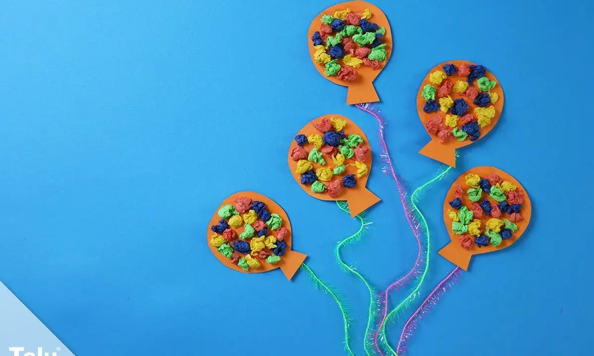 Bunte Luftballons aus Papier, ideal zum Basteln für Fasching mit Kleinkindern.