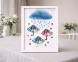 Gerahmte Kunst: Regenschirme aus gefaltetem Geld-Papier, die vor einem blauen Regen-Himmel und Münzen schützen.
