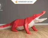 Roter Papier-Krokodil-Bausatz, bereit zum **Schnappi falten**. Ein cooles Deko-Objekt für dein Zuhause.