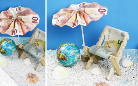 Kreative Ideen: Anker falten Geld zu einer Mini-Strandkulisse mit Liegestuhl und Sonnenschirm aus Euroscheinen.