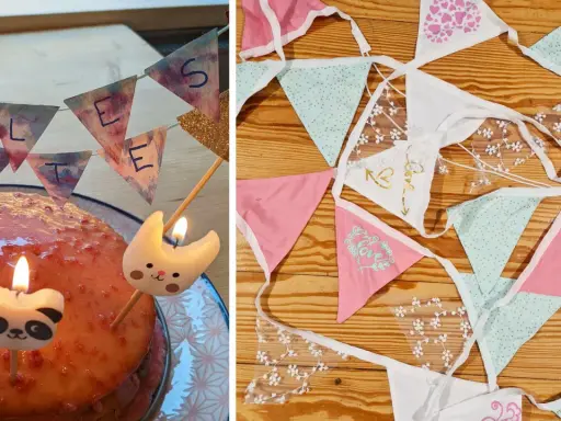 Geburtstagskuchen mit Kerzen und einer selbstgebastelten Papierkette. Daneben liegen weitere bunte Wimpelketten zum Basteln.