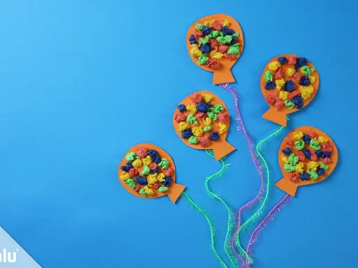 Bunte Luftballons aus Papier, ideal zum Basteln für Fasching mit Kleinkindern.