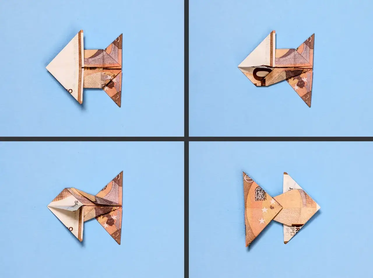 Vier gefaltete Geldscheine, die wie kleine Fische aussehen, schwimmen auf blauem Grund. Ein kreativer fisch falten geld Trick.